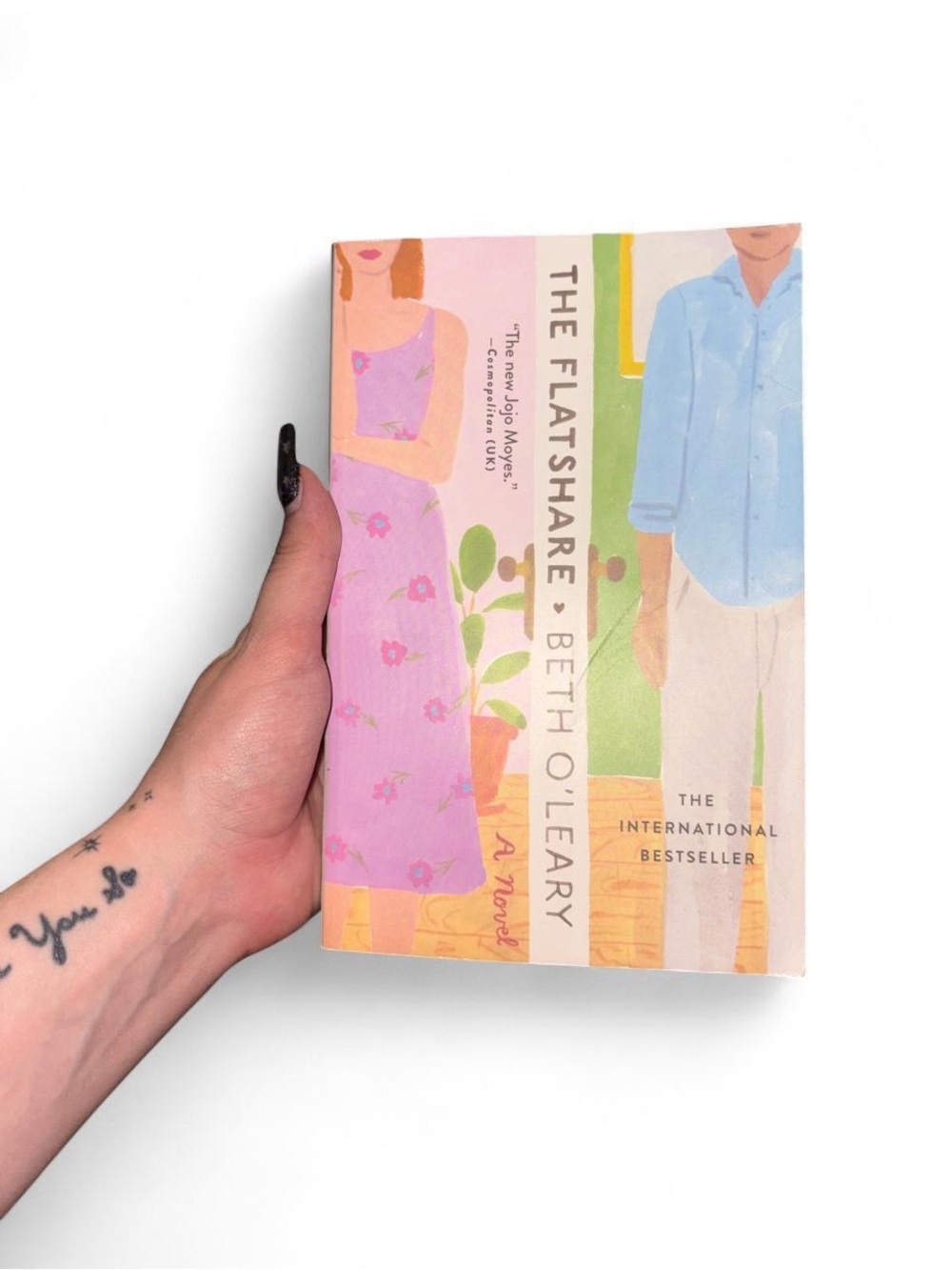 Pink Paperback Novel - The Flatshare